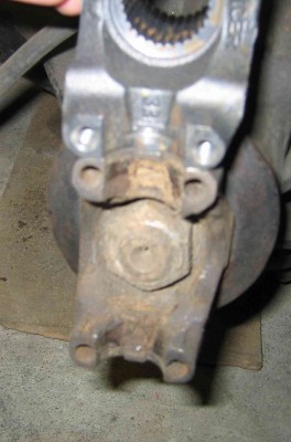 The difference in spacing of the holes in the standard 1310 Dana 60 u-bolt yoke and the new strap yoke and the fact that the strap yoke holes are tapped to about ¼-20