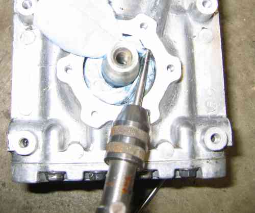 cover the bearing to keep as much out as possible and tap it 10-30