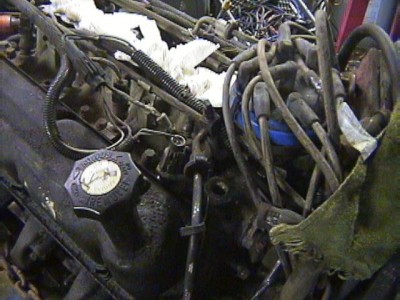 Fuel return line out the front pass. side.